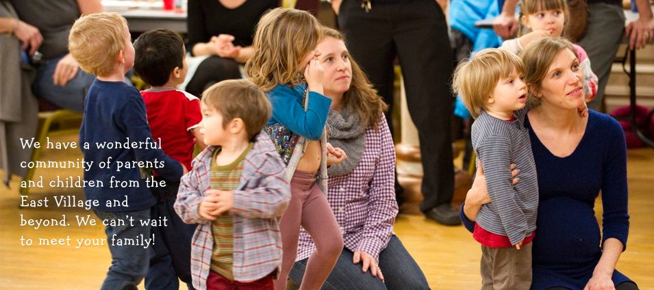 We have a wonderful community of parents and children from the East Village and beyond. Parents and children gather for a school event.